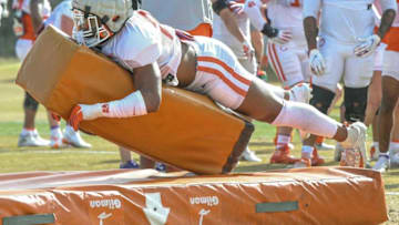 Clemson linebacker Trenton Simpson(22) tackles a pad during football practice in Clemson, S.C. Monday, March 22, 2021.Clemson Spring Football Practice