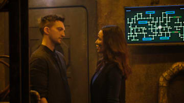 The 100 -- "The Stranger" -- Image Number: HU712b_0476r.jpg -- Pictured (L-R): Richard Harmon as Murphy and Luisa d'Oliveira as Emori -- Photo: Bettina Strauss/The CW -- 2020 The CW Network, LLC. All rights reserved.