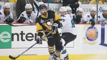 Jun 1, 2016; Pittsburgh, PA, USA; Pittsburgh Penguins defenseman Justin Schultz (4) controls the puck against San Jose Sharks left wing Matt Nieto (83) in the first period of game two of the 2016 Stanley Cup Final at Consol Energy Center. Mandatory Credit: Charles LeClaire-USA TODAY Sports