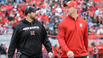 Scott Frost of the Nebraska Cornhuskers and defensive coordinator Erik Chinander walk (Photo by Steven Branscombe/Getty Images)