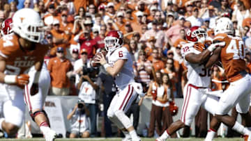 Oct 10, 2015; Dallas, TX, USA; Oklahoma Sooners quarterback Baker Mayfield (6) drops back to pass in the first quarter against the Texas Longhorns during the Red River rivalry at Cotton Bowl Stadium. Mandatory Credit: Tim Heitman-USA TODAY Sports