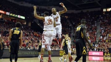 Jan 28, 2016; College Park, MD, USA; Maryland Terrapins forward Damonte Dodd (35) and Maryland Terrapins guard Rasheed Sulaimon (0) celebrate after a basket during the second half against the Iowa Hawkeyes at Xfinity Center. Maryland Terrapins defeated Iowa Hawkeyes 74-68. Mandatory Credit: Tommy Gilligan-USA TODAY Sports