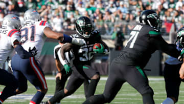 EAST RUTHERFORD, NEW JERSEY - OCTOBER 30: (NEW YORK DAILIES OUT) Michael Carter #32 of the New York Jets in action against the New England Patriots at MetLife Stadium on October 30, 2022 in East Rutherford, New Jersey. The Patriots defeated the Jets 22-17. (Photo by Jim McIsaac/Getty Images)