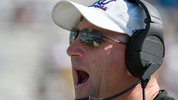 LAWRENCE, KS - SEPTEMBER 23: David Beaty head coach of the Kansas Jayhawks instructs his team against the West Virginia Mountaineers in the fourth quarter at Memorial Stadium on September 23, 2017 in Lawrence, Kansas. (Photo by Ed Zurga/Getty Images)