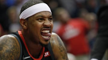 HOUSTON, TX - OCTOBER 24: Carmelo Anthony #7 of the Houston Rockets reacts on the bench in the first half against the Utah Jazz at Toyota Center on October 24, 2018 in Houston, Texas. NOTE TO USER: User expressly acknowledges and agrees that, by downloading and or using this Photograph, user is consenting to the terms and conditions of the Getty Images License Agreement. (Photo by Tim Warner/Getty Images)