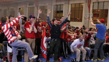 Mar 29, 2014; Dayton, OH, USA; University of Dayton students react as their Flyers attempt a late comeback against the Florida Gators during the Elite 8 tournament game at the University of Dayton RecPlex. Mandatory Credit: Rob Leifheit-USA TODAY Sports