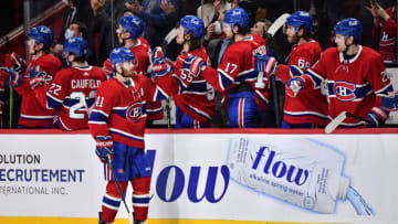MONTREAL, QC - MARCH 24: Paul Byron #41 of the Montreal Canadiens celebrates his goal with teammates on the bench during the third period against the Florida Panthers at Centre Bell on March 24, 2022 in Montreal, Canada. The Florida Panthers defeated the Montreal Canadiens 4-3. (Photo by Minas Panagiotakis/Getty Images)
