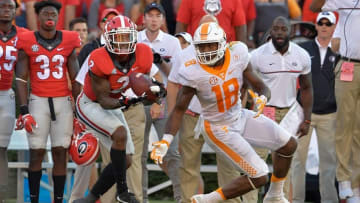 Oct 1, 2016; Athens, GA, USA; Georgia Bulldogs defensive back Maurice Smith (2) intercepts a pass in front of Tennessee Volunteers tight end Jason Croom (18) during the fourth quarter at Sanford Stadium. Tennessee defeated Georgia 34-31. Mandatory Credit: Dale Zanine-USA TODAY Sports
