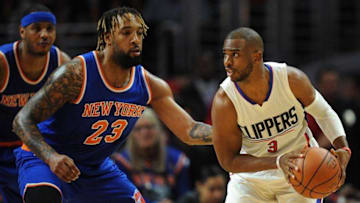 March 11, 2016; Los Angeles, CA, USA; Los Angeles Clippers guard Chris Paul (3) controls the ball against New York Knicks forward Derrick Williams (23) during the first half at Staples Center. Mandatory Credit: Gary A. Vasquez-USA TODAY Sports