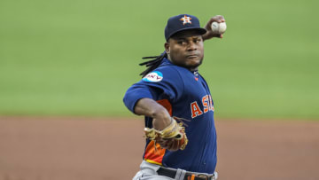 Apr 22, 2023; Cumberland, Georgia, USA; Houston Astros starting pitcher Framber Valdez (59) pitches against the Atlanta Braves during the first inning at Truist Park. Mandatory Credit: Dale Zanine-USA TODAY Sports