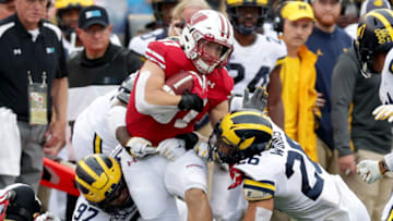 Sep 21, 2019; Madison, WI, USA; Wisconsin Badgers running back Garrett Groshek (37) is tackled after a catch during the 1st half of the Wisconsin Badgers vs. the Michigan Wolverines football game at Camp Randall Stadium. Mandatory Credit: Mike De Sisti/Milwaukee Journal Sentinel via USA TODAY Sports