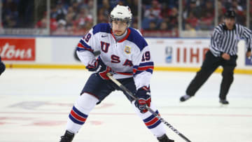 BUFFALO, NY - DECEMBER 26: Chris Kreider #15 of USA carrirs the puck during the 2011 IIHF World U20 Championship Group A game between USA and Finland on December 26, 2010 at HSBC Arena in Buffalo, New York. (Photo by Tom Szczerbowski/Getty Images)
