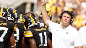 IOWA CITY, IOWA- SEPTEMBER 7: Offensive line coach Brian Ferentz of the Iowa Hawkeyes walks the sidelines in the third quarter against the Missouri State Bears on September 7, 2013 at Kinnick Stadium in Iowa City, Iowa. Iowa won 28-14. (Photo by Matthew Holst/Getty Images)