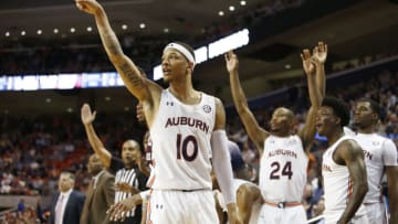 Auburn basketballMar 4, 2020; Auburn, Alabama, USA; Auburn Tigers guard Samir Doughty (10) and the Auburn bench react after a three-point shot against the Texas A&M Aggies during the second half at Auburn Arena. Mandatory Credit: John Reed-USA TODAY Sports