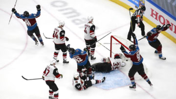 EDMONTON, ALBERTA - AUGUST 12: Nazem Kadri #91 of the Colorado Avalanche celebrates with his teammates after scoring a goal on Darcy Kuemper #35 of the Arizona Coyotes during the third period in Game One of the Western Conference First Round during the 2020 NHL Stanley Cup Playoffs at Rogers Place on August 12, 2020 in Edmonton, Alberta, Canada. (Photo by Jeff Vinnick/Getty Images)