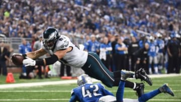 Nov 26, 2015; Detroit, MI, USA; Philadelphia Eagles tight end Brent Celek (87) jumps over Detroit Lions strong safety Isa Abdul-Quddus (42) to score a touchdown during the second quarter of a NFL game on Thanksgiving at Ford Field. Mandatory Credit: Tim Fuller-USA TODAY Sports