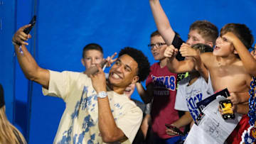 Sep 8, 2023; Lawrence, Kansas, USA; Kansas Jayhawks basketball player Kevin McCullar takes a photo with fans during the second half against the Illinois Fighting Illini at David Booth Kansas Memorial Stadium. Mandatory Credit: Jay Biggerstaff-USA TODAY Sports