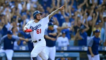 LOS ANGELES, CA - SEPTEMBER 02: Alex Verdugo #61 of the Los Angeles Dodgers runs home after being driven in on a double by Matt Kemp to win the game in the nineth inning against the Arizona Diamondbacks at Dodger Stadium on September 2, 2018 in Los Angeles, California. (Photo by John McCoy/Getty Images)