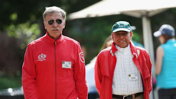 SUN VALLEY, ID - JULY 08: Stan Kroenke (L), owner of Kroenke Sports Enterprises, which includes the Denver Nuggets of the NBA, Colorado Avalanche of the NHL, Colorado Rapids of Major League Soccer, Colorado Mammoth of the National Lacrosse League and St. Louis Rams of the NFL, chats with Ananda Krishnan, Malaysian businessman and philanthropist, at the Allen