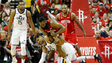 HOUSTON, TX - APRIL 24: James Harden #13 of the Houston Rockets steals the ball from Thabo Sefolosha #22 of the Utah Jazz in the second half during Game Five of the first round of the 2019 NBA Western Conference Playoffs between the Houston Rockets and the Utah Jazz at Toyota Center on April 24, 2019 in Houston, Texas. (Photo by Tim Warner/Getty Images)