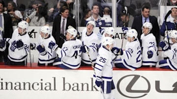 Oct 22, 2016; Chicago, IL, USA; Toronto Maple Leafs left wing James van Riemsdyk (25) and teammates celebrate his goal against the Chicago Blackhawks in the second period at the United Center. Mandatory Credit: Matt Marton-USA TODAY Sports