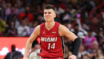 Tyler Herro #14 of the Miami Heat celebrates a three pointer by Max Strus #31 (not pictured) against the Detroit Pistons(Photo by Michael Reaves/Getty Images)