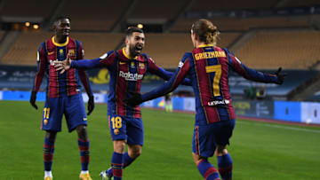 Antoine Griezmann of Barcelona celebrates with team mates (L - R) Ousmane Dembele and Jordi Alba. (Photo by David Ramos/Getty Images)