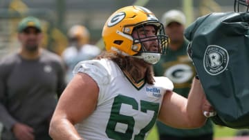 May 31, 2022; Green Bay, WI, USA; Green Bay Packers player Jake Hanson (67) during organized team activities (OTA) Tuesday, May 31, 2022 in Green Bay, Wis. Mandatory Credit: Mark Hoffman-USA TODAY Sports