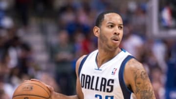 Feb 28, 2014; Dallas, TX, USA; Dallas Mavericks point guard Devin Harris (20) during the game against the Chicago Bulls at the American Airlines Center. The Bulls defeated the Mavericks 100-91. Mandatory Credit: Jerome Miron-USA TODAY Sports