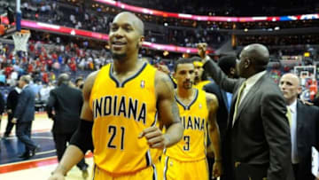 May 11, 2014; Washington, DC, USA; Indiana Pacers power forward David West (21) and Indiana Pacers point guard George Hill (3) react after the game against the Washington Wizards in game four of the second round of the 2014 NBA Playoffs at Verizon Center. The Pacers won 95-92. Mandatory Credit: Brad Mills-USA TODAY Sports