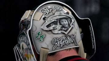 LAS VEGAS, NV - MARCH 16: Alex Stalock #32 of the Minnesota Wild wears a mask with an image of his son Simon Stalock on the back during a game against the Vegas Golden Knights at T-Mobile Arena on March 16, 2018 in Las Vegas, Nevada. The Wild won 4-2. (Photo by Ethan Miller/Getty Images)