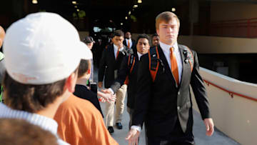 AUSTIN, TX - SEPTEMBER 02: Sam Ehlinger #11 of the Texas Longhorns shakes hands with fans as he enters the stadium before the game against the Maryland Terrapins at Darrell K Royal-Texas Memorial Stadium on September 2, 2017 in Austin, Texas. (Photo by Tim Warner/Getty Images)