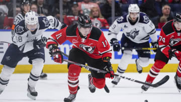 QUEBEC CITY, QC - OCTOBER 18: James Malatesta #11 of the Quebec Remparts skates with the puck against the Rimouski Oceanic during their QMJHL hockey game at the Videotron Center on October 18, 2019 in Quebec City, Quebec, Canada. (Photo by Mathieu Belanger/Getty Images)
