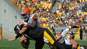 PITTSBURGH, PA - SEPTEMBER 7: Linebackers Barkevious Mingo #51 and Paul Kruger #99 of the Cleveland Browns sack quarterback Ben Roethlisberger #7 of the Pittsburgh Steelers during a game at Heinz Field on September 7, 2014 in Pittsburgh, Pennsylvania. The Steelers defeated the Browns 30-27. (Photo by George Gojkovich/Getty Images)