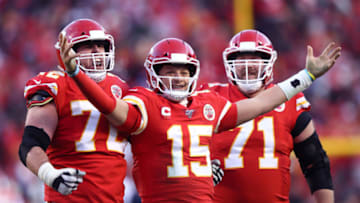 Patrick Mahomes #15 of the Kansas City Chiefs reacts with teammates Eric Fisher #72 and Mitchell Schwartz #71 after a fourth quarter touchdown pass (Photo by Jamie Squire/Getty Images)