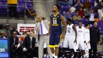 Jan 4, 2016; Fort Worth, TX, USA; West Virginia Mountaineers guard Tarik Phillip (12) reacts during the second half against the TCU Horned Frogs at Ed and Rae Schollmaier Arena. Mandatory Credit: Kevin Jairaj-USA TODAY Sports