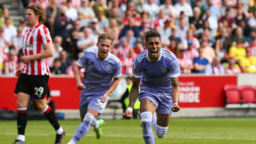BRENTFORD, ENGLAND - MAY 22: Raphinha of Leeds celebrates scoring the opening goal from the penalty spot during the Premier League match between Brentford and Leeds United at Brentford Community Stadium on May 22, 2022 in Brentford, United Kingdom. (Photo by Craig Mercer/MB Media/Getty Images)