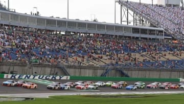 Jul 8, 2016; Sparta, KY, USA; NASCAR Xfinity Series driver Kyle Busch (18) leads the field across the start line during the ALSCO 300 at Kentucky Speedway. Mandatory Credit: Christopher Hanewinckel-USA TODAY Sports