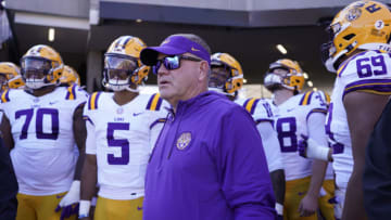 COLUMBIA, MISSOURI - OCTOBER 07: Head coach Brian Kelly of the LSU Tigers stands with his team as they waits to take to the field prior to a game against the Missouri Tigers at Faurot Field/Memorial Stadium on October 07, 2023 in Columbia, Missouri. (Photo by Ed Zurga/Getty Images)