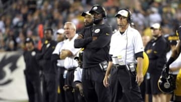 Aug 21, 2014; Philadelphia, PA, USA; Pittsburgh Steelers head coach Mike Tomlin and defensive coordinator Dick LeBeau watch game against the Philadelphia Eagles at Lincoln Financial Field. The Eagles defeated the Steelers, 31-21. Mandatory Credit: Eric Hartline-USA TODAY Sports