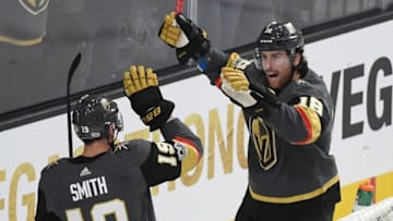 LAS VEGAS, NV - OCTOBER 10: James Neal #18 of the Vegas Golden Knights celebrates with teammate Reilly Smith #19 after Neal scored a first-period goal against the Arizona Coyotes during the Golden Knights' inaugural regular-season home opener at T-Mobile Arena on October 10, 2017 in Las Vegas, Nevada. (Photo by Ethan Miller/Getty Images)