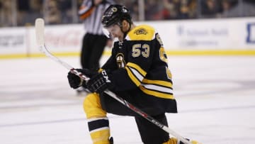 Dec 29, 2014; Boston, MA, USA; Boston Bruins center Seth Griffith (53) celebrates after scoring a goal during the third period against the Detroit Red Wings at TD Banknorth Garden. The Bruins won 5-2. Mandatory Credit: Greg M. Cooper-USA TODAY Sports