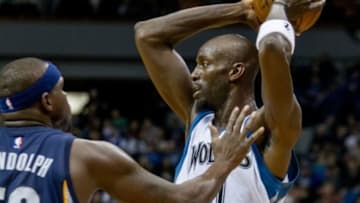 Feb 28, 2015; Minneapolis, MN, USA; Minnesota Timberwolves forward Kevin Garnett (21) looks to pass against Memphis Grizzlies forward Zach Randolph (50) in the third quarter at Target Center. The Grizzlies win 101-97. Mandatory Credit: Bruce Kluckhohn-USA TODAY Sports