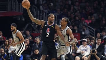 LOS ANGELES, CA - OCTOBER 31: Kawhi Leonard #2 of the Los Angeles Clippers is defended by DeMar DeRozan #10 of the San Antonio Spurs during the second half of the basketball game at Staples Center on October 31, 2019 in Los Angeles, California. NOTE TO USER: User expressly acknowledges and agrees that, by downloading and/or using this Photograph, user is consenting to the terms and conditions of the Getty Images License Agreement. (Photo by Kevork Djansezian/Getty Images)