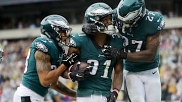 PHILADELPHIA, PA - OCTOBER 29: Jalen Mills #31 of the Philadelphia Eagles is congratulated by teammates Dexter McDougle #33 and Malcolm Jenkins #27 after Mills picked off a pass from C.J. Beathard of the San Francisco 49ers and ran it in for a touchdown in the second quarter on October 29, 2017 at Lincoln Financial Field in Philadelphia, Pennsylvania. (Photo by Elsa/Getty Images)