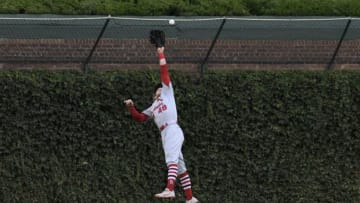 CHICAGO, IL - SEPTEMBER 28: Harrison Bader #48 of the St. Louis Cardinals makes a catch on Jason Heyward #22 of the Chicago Cubs during the sixth inning on September 28, 2018 at Wrigley Field in Chicago, Illinois. (Photo by David Banks/Getty Images)
