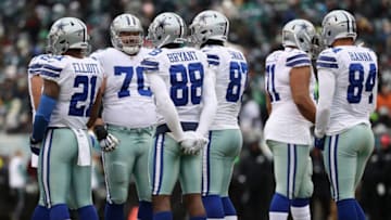 PHILADELPHIA, PA - DECEMBER 31: Wide receiver Dez Bryant #88 of the Dallas Cowboys and teammates gather on the field against the Philadelphia Eagles during the first half of the game at Lincoln Financial Field on December 31, 2017 in Philadelphia, Pennsylvania. (Photo by Elsa/Getty Images)