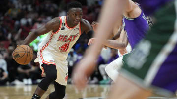 Miami Heat guard Victor Oladipo (4) drives to the basket against the Milwaukee Bucks(Jim Rassol-USA TODAY Sports)