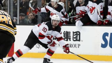 BOSTON, MA - JANUARY 23: New Jersey Devils winger Marcus Johansson (90) looks to pass as he gains the blue line during a game between the Boston Bruins and the New Jersey Devils on January 23, 2018, at TD Garden in Boston, Massachusetts. The Bruins defeated the Devils 3-2. (Photo by Fred Kfoury III/Icon Sportswire via Getty Images)