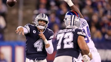 EAST RUTHERFORD, NEW JERSEY - NOVEMBER 04: Quarterback Dak Prescott #4 of the Dallas Cowboys delivers a pass over the defense of the New York Giants during the game at MetLife Stadium on November 04, 2019 in East Rutherford, New Jersey. (Photo by Elsa/Getty Images)